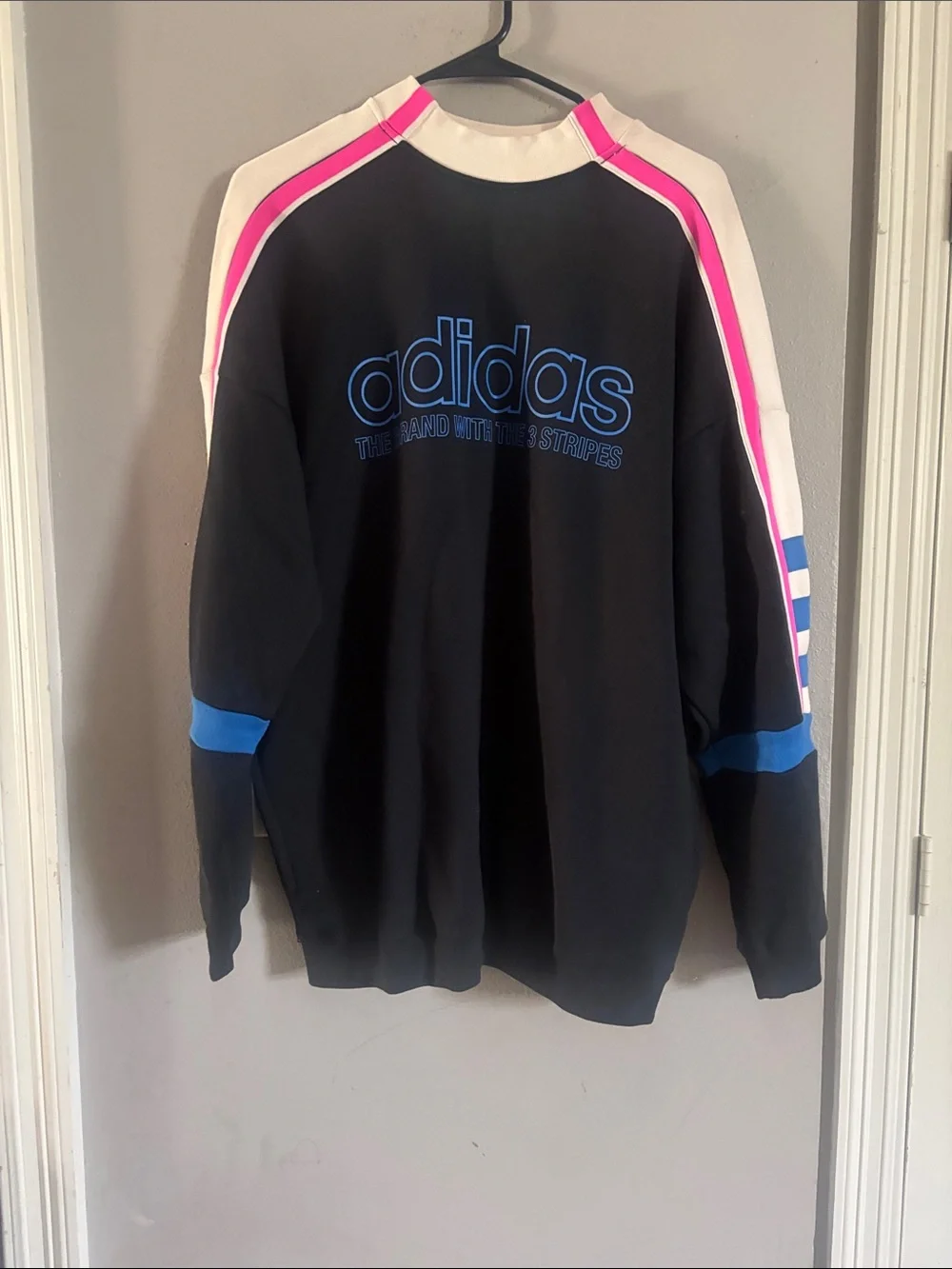 adidas Black Crewneck Sweatshirt with Blue Logo and Pink Trim